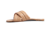 Surfbird leather slide sandal in beach - product side shot